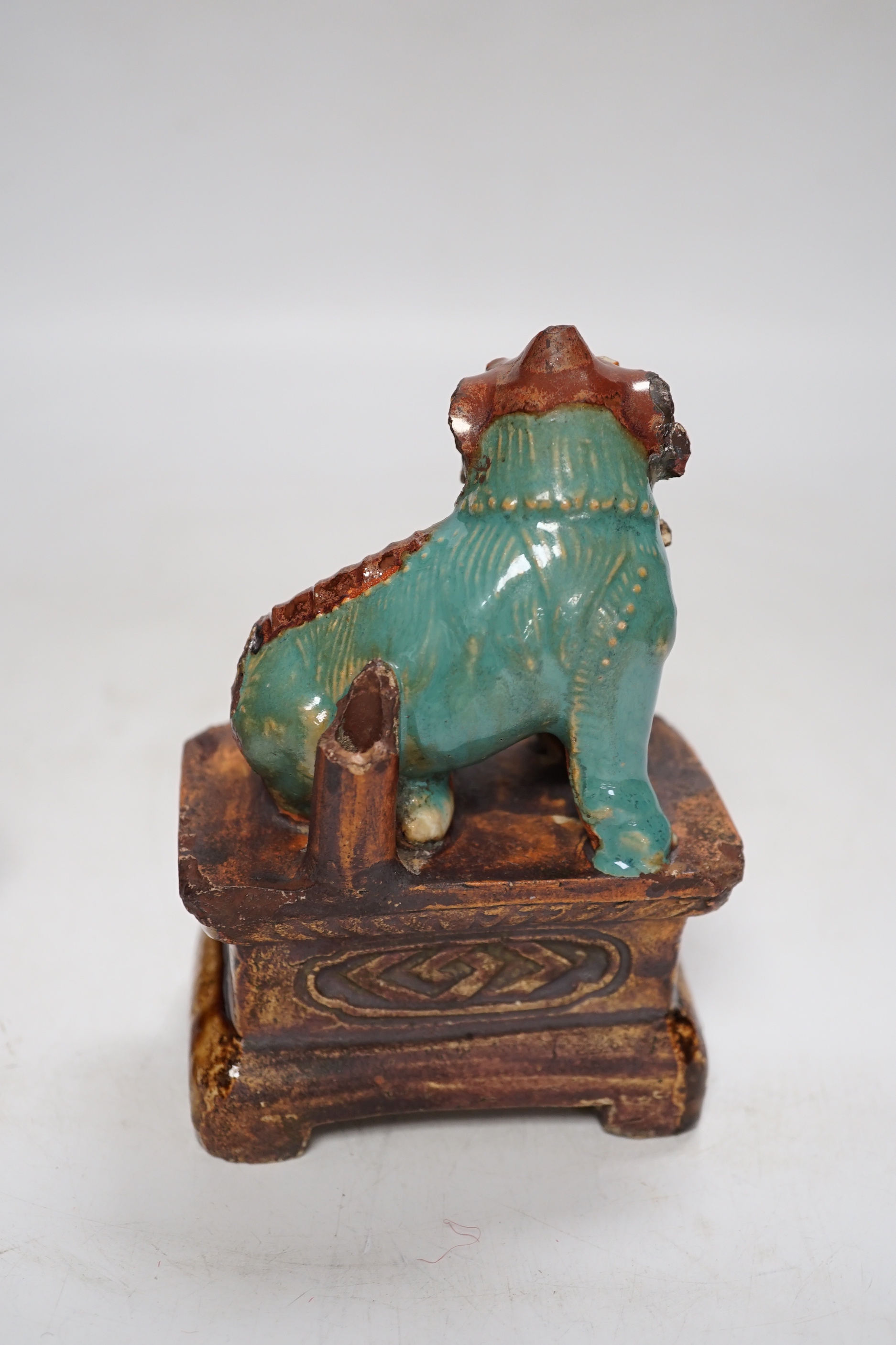 A 19th century Chinese Shiwan figure of a lion-dog, a celadon glazed shallow bowl and a cloisonné enamel censer, tallest 14cm (3)